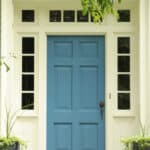 A beautiful blue front door welcomes you